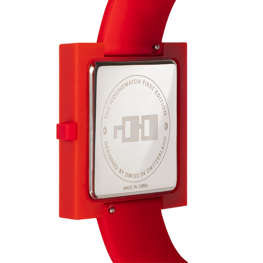 Nounswatch red Case: TR90 thermoplastic. Incredibly durable, flexible, and lightweight.  Sizes: Square 42 mm x 42 mm x 6 mm thickness Movement: Japanese Miyota GL22 Dial: Special Mysterious time display, black Glass: Sapphire with anti-reflective coating  Strap: 22mm Silicone